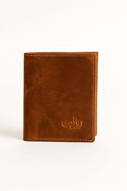 Stylish handcrafted brown leather wallet displayed in a half-open position, featuring multiple compartments, a secure zip pocket, and card slots. Perfect men’s wallet design for everyday essentials with durability and premium finish.